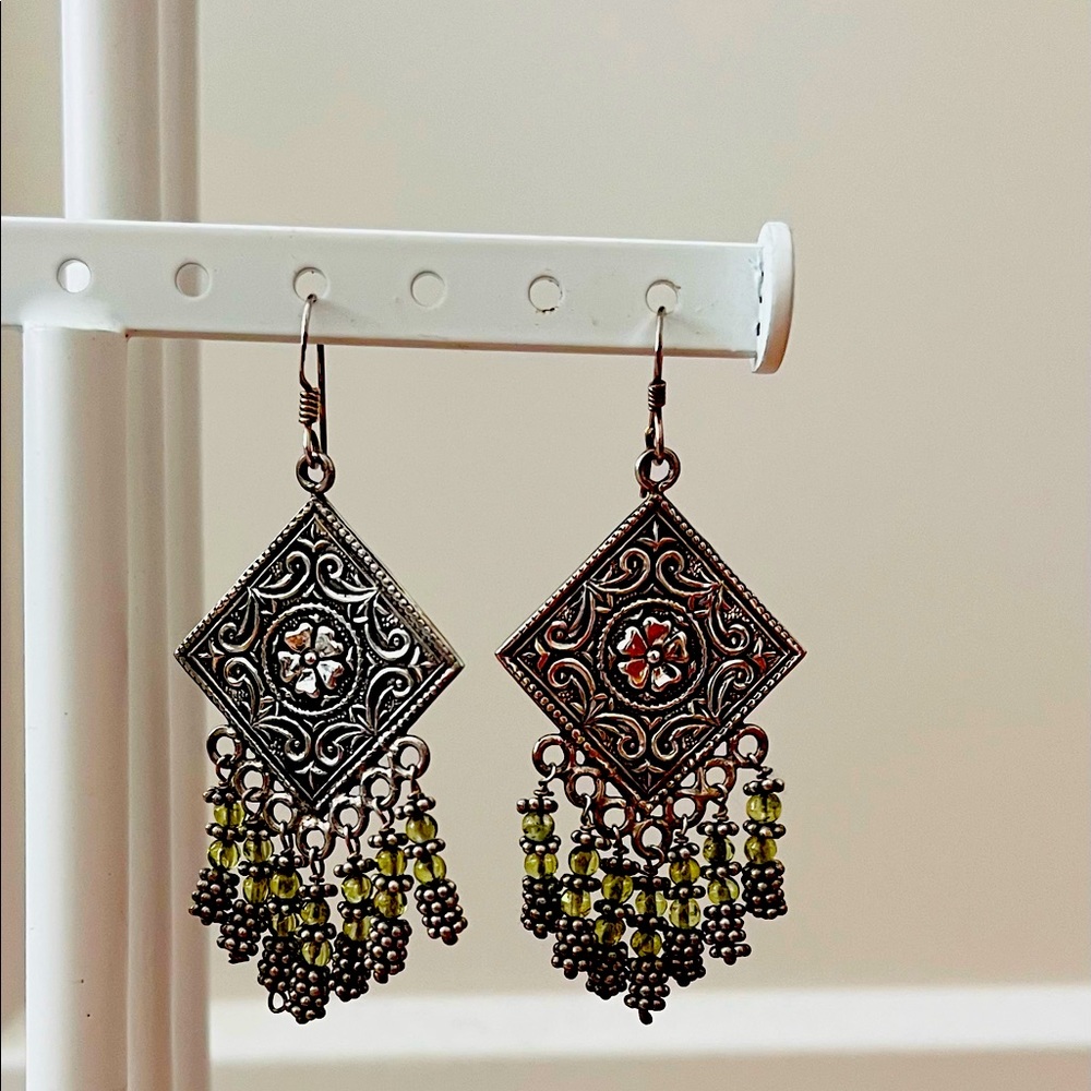 Pair of silver handcrafted earrings with green stones. Genuine silver handmade.